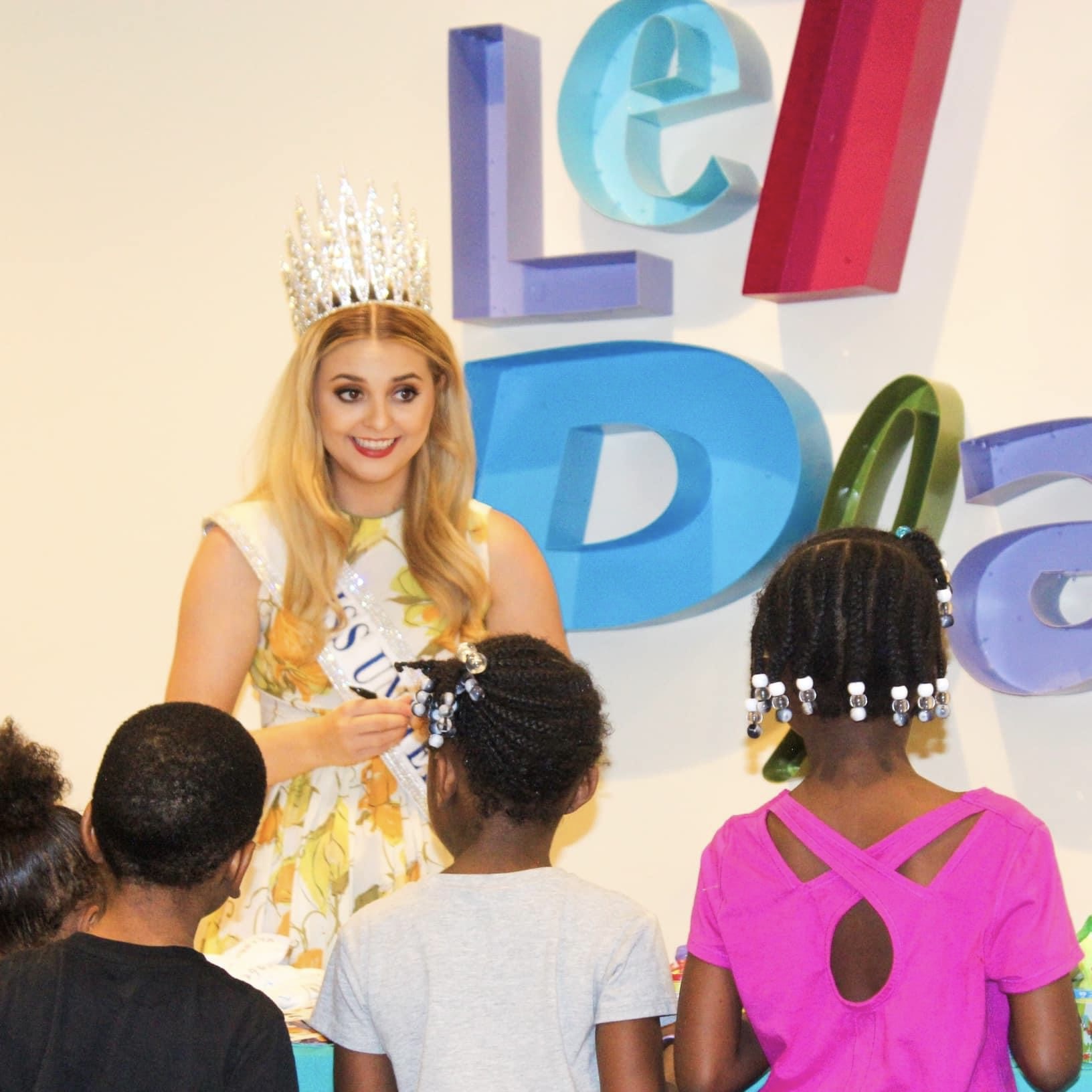 Lily with children at the Cleveland children's museum